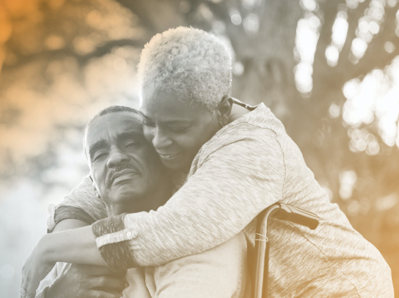 woman-hugging-patient-in-wheelchair